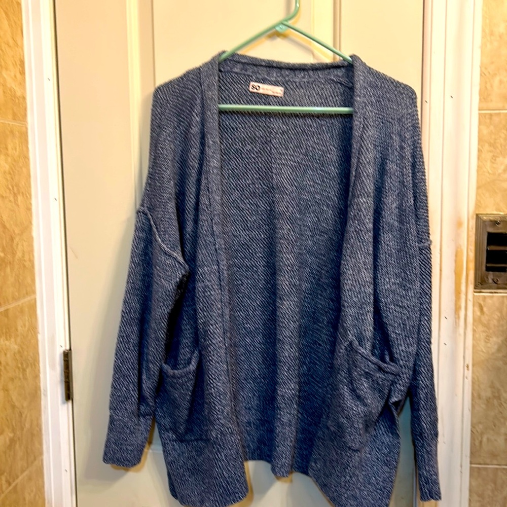 Women’s size medium blue knit cardigan with pockets
